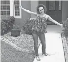  ?? JODI MEYERS ?? Jodi Meyers stands in front of the house she purchased despite her $55,000 in student debt.