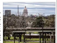  ?? RICARDO B. BRAZZIELL / AMERICAN-STATESMAN ?? The proposed Rosewood Park view corridor would protect this sight line of the Texas Capitol, as seen here in February from 900 Thompson St.
