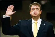  ?? ASSOCIATED PRESS ?? IN THIS JUNE 27 FILE PHOTO, Veterans Affairs Secretary nominee Robert Wilkie is sworn in at the start of a Senate Veterans Affairs Committee nomination­s hearing on Capitol Hill in Washington. The Senate on Monday confirmed Wilkie as secretary of Veterans Affairs.