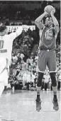  ?? [PHOTO BY NATE
BILLINGS, THE OKLAHOMAN] ?? Golden State’s Kevin Durant, right, shoots a 3-pointer against Oklahoma City’s Russell Westbrook during Saturday night’s game at Chesapeake Energy Arena.