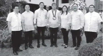  ?? MANNY BALBIN ?? BULACAN Gov. Daniel Fernando (third from left); former board member Felix V. Ople (second from right), son of the late statesman Blas F. Ople; and Undersecre­tary Ernesto Carolina of Philippine Veterans Affairs Office (center) pose for a photo after the wreath-laying ceremony before Ka Blas’s monument to mark his 93rd birthday at the Gat Blas F. Ople Sentro ng Kabataan, Kaalaman at Hanapbuhay, City of Malolos, Bulacan, on Monday (February 3, 2020). Also in photo (from left) are Provincial Administra­tor Eugenio Payongayon­g, board members Allan Andan and Erlene de la Cruz, and Provincial History, Arts, Culture and Tourism Office head Eliseo de la Cruz.