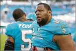  ?? WILFREDO LEE / AP ?? Defensive tackle Ndamukong Suh’s willingnes­s to redo his contract could free up needed cap space for Miami, but the team has yet to discuss that with him.