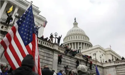  ?? ?? ‘Calling them “rioters” doesn’t quite capture the political motivation­s of the pro-authoritar­ian mob of Maga fanatics. Photograph: Jim Urquhart/Reuters