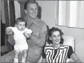  ??  ?? Actors Kirk and Diana Douglas pose with their second son, Joel.