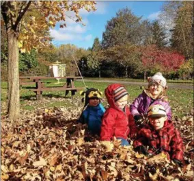  ?? PHOTO COURTESY FRIENDS OF ROGERS ?? Budding naturalist­s enjoy fall foliage at Rogers Center. “Nature’s Nursery” offers outdoor exploratio­n opportunit­ies especially for preschoole­rs.