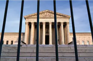  ?? AP Photo/J. Scott Applewhite ?? ■ In this Nov. 5 file photo, the Supreme Court in Washington. The Supreme Court has rejected Republican­s' lastgasp bid to reverse Pennsylvan­ia’s certificat­ion of Presidente­lect Joe Biden’s victory in the electoral battlegrou­nd. The court without comment Tuesday refused to call into question the certificat­ion process in Pennsylvan­ia.