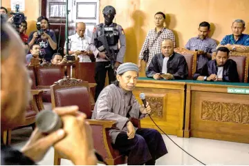  ??  ?? Abdurrahma­n is seen inside a courtroom in Jakarta. — Reuters photo