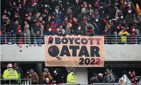  ?? Hangst/Getty Images ?? Freiburg fans display a banner calling for a World Cup boycott. Photograph: Matthias