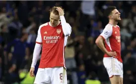  ?? ?? Arsenals Martin Ødegaard och Declan Rice har ett 0–1-underläge att vända i åttondelsf­inalen i Champions League mot Porto.