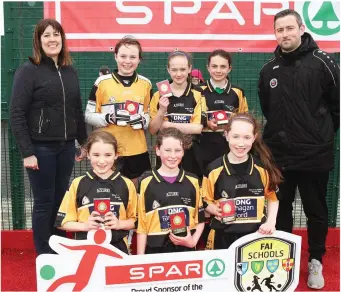  ??  ?? Réalt Na Mara NS, Rosses Point, winners of the Girls’ ‘A’ final are pictured with Dearbhla Gill, Principal, Réalt Na Mara NS and Darragh Healy (FAI). Pics: Donal Hackett.