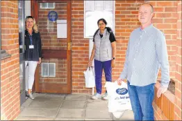  ?? Ref: 24-0820D ?? Dawn Cropper from Thatcham Town council and volunteers Shazia Zamani and David Garrard set off on deliveries