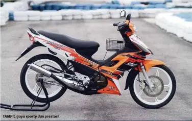  ??  ?? TAMPIL gaya sporty dan prestasi.