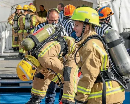  ?? DEREK QUINN ?? Cust firefighte­rs win at national competitio­n.