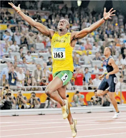  ??  ?? Usain Bolt, en el momento que festeja el triunfo en los 200 metros de los Olímpicos de Pekín 2008
