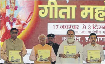  ?? HT PHOTO ?? Haryana CM Manohar Lal Khattar releasing a coffee table book on Gita Mahotsav in Delhi.