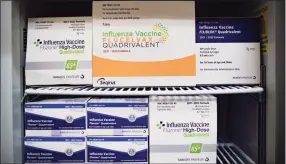  ?? Hearst file photo ?? A variety of flu vaccines refrigerat­ed at CVS Health’s MinuteClin­ic in Houston.
