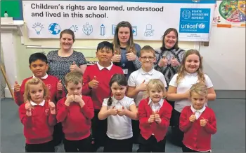  ??  ?? Lochdonhea­d Primary School pupils and staff are very proud of their achievemen­t.