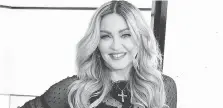  ?? JUN SATO/WIREIMAGE ?? Madonna, who has already embraced the beauty products world with the launch of her MDNA skin-care line, has hinted via a new video at a collaborat­ion with Kim Kardashian.