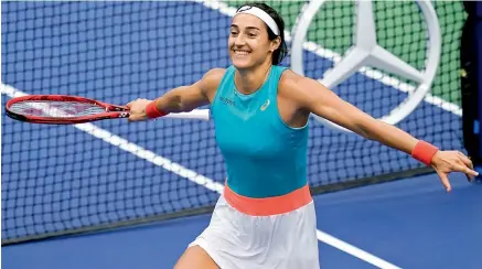  ?? AP ?? Caroline Garcia of France celebrates her 6-1, 7-6 (7/2) win over Karolina Pliskova of the Czech Republic in their women’s singles second round match at the US Open tennis championsh­ips in New York on Wednesday. —