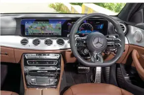  ??  ?? Top: AMG steering wheel differenti­ates E 53’s cabin from regular E-Class.
Above: E 63 gets a bit less bright work and drive mode dials on steering wheel.
Facing page, top: That’s all the sliding action you’re going to get from the E 53. Below: The E 63 S is just getting started though in Drift Mode