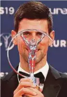  ?? REUTERS PIC ?? Novak Djokovic with the Laureus sportsman of the year award in Monaco on Monday.