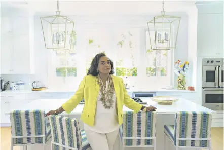  ?? MALCOLM JACKSON/NEW YORK TIMES ?? Elaine Griffin, an interior designer, at a home in Sea Island, Ga. While many Americans were stockpilin­g toilet paper and Clorox, the rich bought houses, sparking a gold rush in the decorating trades.