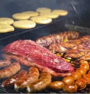  ??  ?? from above, clockwise
A typical asado cooked over a parrilla grill; sancocho soup; chicharron­es; a street-food arepa with lamb and caramelise­d onion; the Venezuelan capital Caracas; hallacas being hand-wrapped in banana leaves