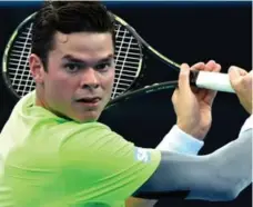  ?? SAEED KHAN/AFP/GETTY IMAGES PHOTOS ?? Canadian Milos Raonic, above, eyes a return in semifinal win over Kei Nishikori at the Brisbane Internatio­nal. He’ll face Roger Federer, left, seeking career match win No. 1,000 in the final.