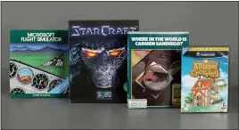  ?? Photos and text from The Associated Press ?? Four video games, from left, “Microsoft Flight Simulator,” “StarCraft,” “Where in the World Is Carmen Sandiego?” and “Animal Crossing” were inducted into the World Video Game Hall of Fame in Rochester, N.Y.