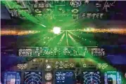  ?? FEDERAL AVIATION ADMINISTRA­TION VIA THE NEW YORK TIMES ?? An image from video provided by the Federal Aviation Administra­tion shows a laser shining in the direction of an aircraft, creating a dangerous condition for pilots. When a laser pointer reaches a cockpit, it can disorient or “completely incapacita­te” a pilot, says the agency, which recorded more than 9,700 such cases last year.