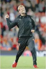  ?? — Reuters ?? Liverpool manager Juergen Klopp celebrates after the match.