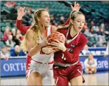  ?? KYLE FRANKO — TRENTONIAN PHOTO ?? Rider’s Mariona Cos-Morales, right, ties up Fairfield’s Emina Selimovic, left, during a MAAC Tournament women’s quarterfin­al game on Wednesday afternoon at Boardwalk Hall in Atlantic City.