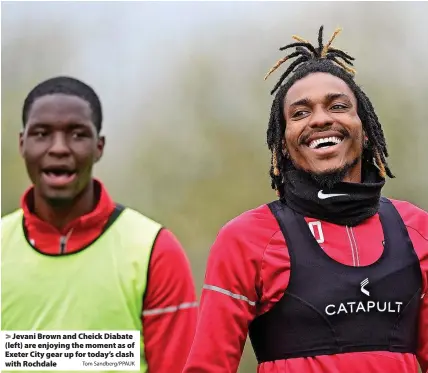  ?? Tom Sandberg/PPAUK ?? Jevani Brown and Cheick Diabate (left) are enjoying the moment as of Exeter City gear up for today’s clash with Rochdale