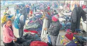  ?? ?? Locals flock flea market to procure affordable woollens in Civil Lines in Prayagraj.