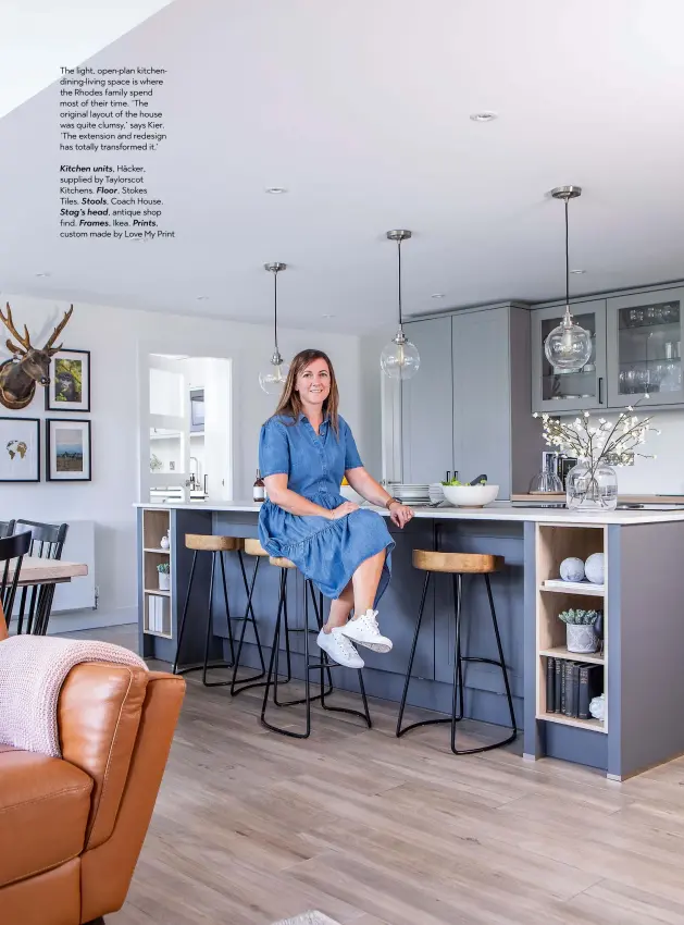  ??  ?? The light, open-plan kitchendin­ing-living space is where the Rhodes family spend most of their time. ‘The original layout of the house was quite clumsy,’ says Kier. ‘The extension and redesign has totally transforme­d it.’
Kitchen units, Häcker, supplied by Taylorscot Kitchens. Floor, Stokes
Tiles. Stools, Coach House.
Stag’s head, antique shop find. Frames, Ikea. Prints, custom made by Love My Print