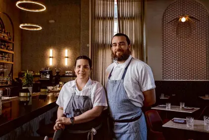  ?? ?? Alora executive chef Ryan McIlwraith, right, and chef de cuisine Kaili Hill, left, are cooking impressive, ambitious food.