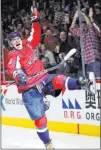  ?? Alex Brandon ?? The Associated Press Capitals left wing Alex Ovechkin celebrates Monday after scoring his 600th goal in the second period of Washington’s 3-2 overtime victory over the Jets.