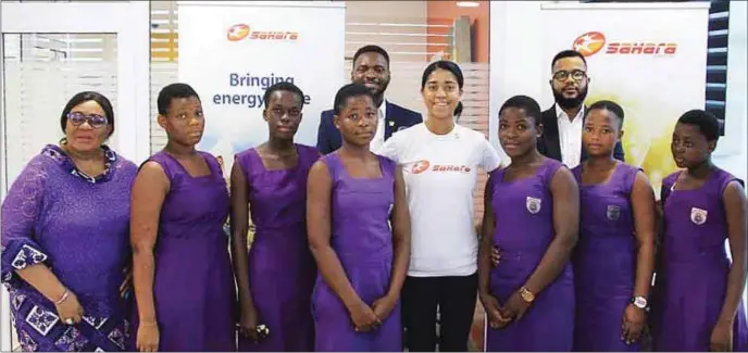  ?? Photo: Sahara Group ?? Sahara’s Girl Child Education Ambassador, Zuriel Oduwole (in white) flanked by teenage beneficiar­ies of a film making class
