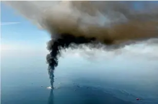  ?? AP ?? The consequenc­es of the disaster are still being learned, 10 years after BP’s Deepwater Horizon offshore oil rig burned in the Gulf of Mexico.