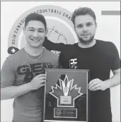  ?? Photo submitted ?? Coby Iwaasa (left) of Lethbridge and Samuel Murray from Quebec won the 2018 national doubles racquetbal­l title.