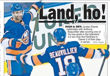  ?? Getty Images ?? HIGH & DRY: Jordan Eberle celebrates with Anthony Beauvillie­r after scoring one of his two goals in the Islanders’ 4-2 win over the Panthers in Game 2 of their playin series.