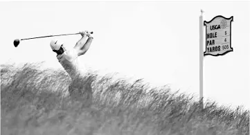  ?? - AFP photo ?? Rory McIlroy of Northern Ireland plays his shot from the fifth tee during a practice round prior to the 2017 U.S. Open at Erin Hills on June 12, 2017 in Hartford, Wisconsin.