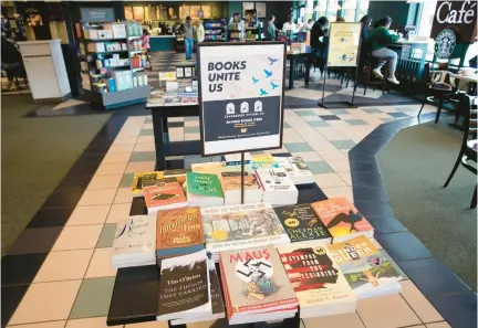  ?? TED SHAFFREY/AP ?? A display of banned books is in a Barnes & Noble book store in Pittsford, New York, in September.