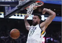  ?? THE ASSOCIATED PRESS — 2022 ?? The Utah Jazz sent center Rudy Gobert to the Minnesota Timberwolv­es in a deal that includes five first-round picks.