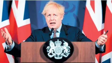  ?? Foto efe ?? Boris Johnson durante una conferenci­a de prensa después de alcanzar el acuerdo.