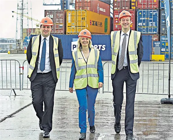  ?? ?? Liz Truss, during her tenure as Trade Secretary, with Simon Clarke, right, on a visit to the Tees Valley with its mayor, Ben Houchen, left