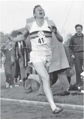  ?? FILE PHOTO BY THE ASSOCIATED PRESS ?? Britain’s Roger Bannister crosses the finish line on May 6, 1954, in Oxford, England, to become the first person to run a mile in less than four minutes. He died Saturday at the age of 88.