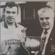  ??  ?? Ciaran Bishop of the WDFL presents Rathnew’s Eamon Franey with the Charlie Bishop Cup.