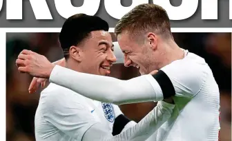  ?? REX ?? Share the love: Vardy is embraced by Lingard after his goal against Italy