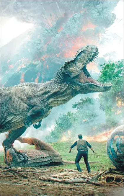  ?? Universal Pictures / Amblin Entertainm­ent / Legendary Pictures Production­s ?? IN “JURASSIC WORLD: Fallen Kingdom,” Chris Pratt’s researcher-turned-dinosaur-crusader is advancing a tradition.